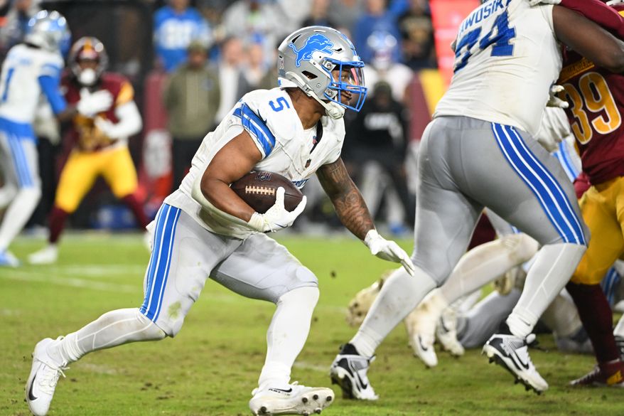 Detroit Lions running back David Montgomery (5) running with the ball during the 2nd half of an NFL game against the Washington Commanders at Northwest Stadium in Landover, MD, November 9, 2025. (Photo for the Washington Times)