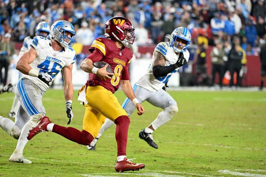 Washington Commanders quarterback Marcus Mariota (8) running with the ball during the 2nd half of an NFL game against the Detroit Lions at Northwest Stadium in Landover, MD, November 9, 2025. (Photo for the Washington Times)