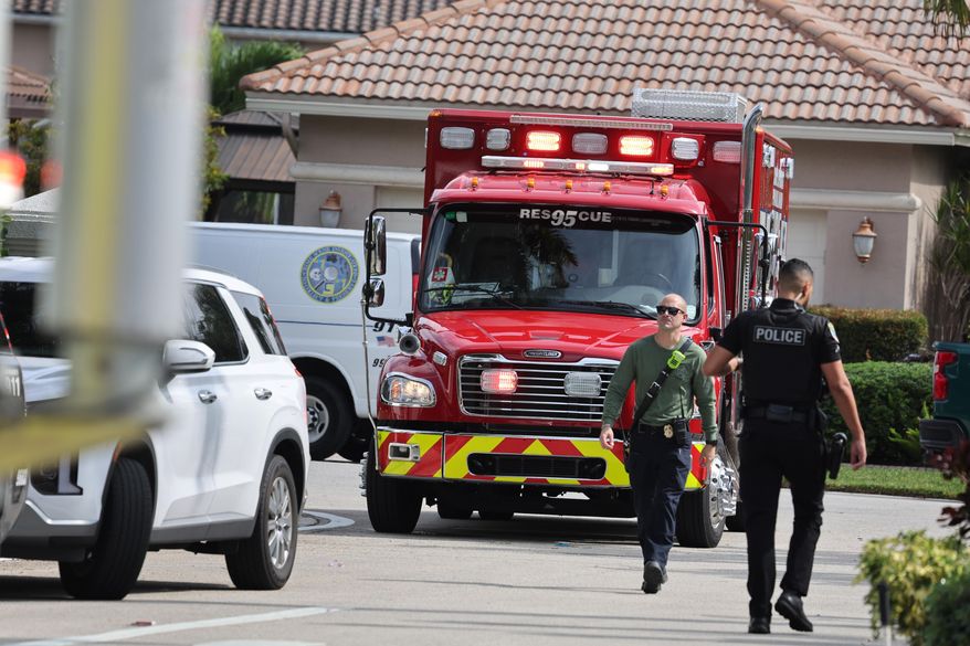Emergency personnel from Coral Springs and Coconut Creek are on scene where a plane crashed in the Windsor Bay community in Coral Springs on Monday, Nov. 10, 2025. (Carline Jean/South Florida Sun-Sentinel via AP)