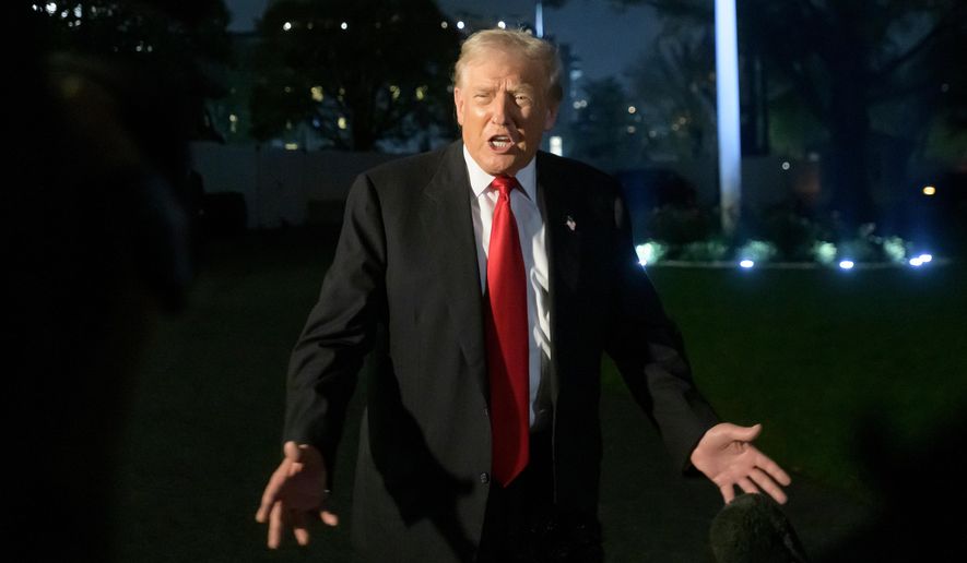 President Donald Trump talks with reporters upon his arrival at the White House in Washington, Sunday, Nov. 9, 2025. (AP Photo/Rod Lamkey, Jr.)