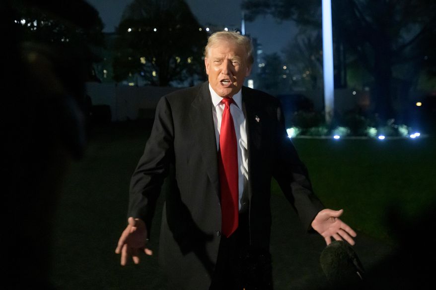 President Donald Trump talks with reporters upon his arrival at the White House in Washington, Sunday, Nov. 9, 2025. (AP Photo/Rod Lamkey, Jr.)