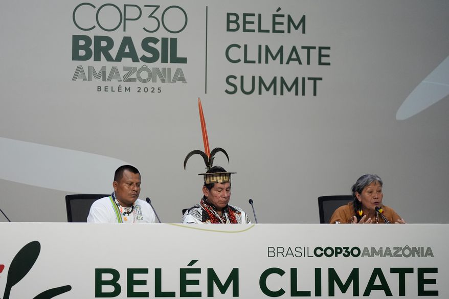 Indigenous peoples Samuel Pinedo, from left, Cline Jorge Chauca Lopez and Teresita Irene Antazu Lopez speak on fires and droughts in the Amazon at the COP30 U.N. Climate Summit, Monday, Nov. 10, 2025, in Belem, Brazil. (AP Photo/Fernando Llano)