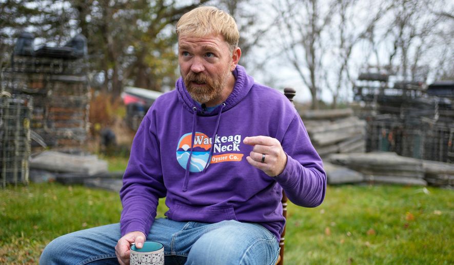 Graham Platner, Democratic candidate for U.S. Senate, speaks to a reporter at his home, Monday, Nov. 3, 2025, in Sullivan, Maine. (AP Photo/Robert F. Bukaty)