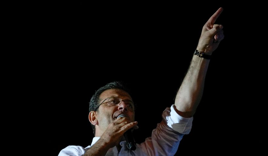 FILE - Istanbul Mayor and Republican People's Party, or CHP, candidate Ekrem Imamoglu addresses supporters outside the City Hall in Istanbul, Turkey, early Monday, April 1, 2024. (AP Photo/Khalil Hamra, file)