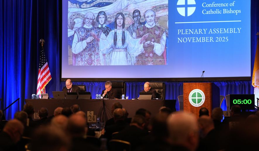 From left; Rev. Michael J.K. Fuller, Archbishop Timothy Broglio and Archbishop William Lori of Baltimore conduct the United States Conference of Catholic Bishops plenary assembly in Baltimore, Tuesday, Nov. 11, 2025. (AP Photo/Stephanie Scarbrough)