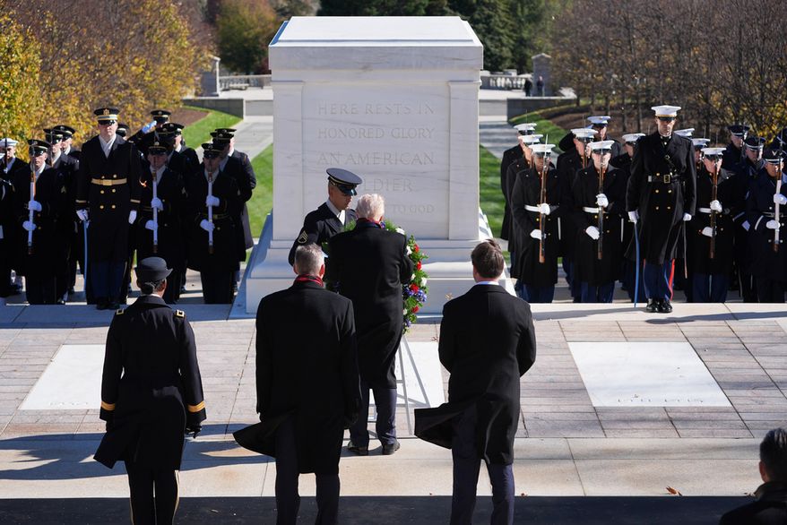 President Donald Trump lays a wreath at the Tomb of the Unknown Soldier at Arlington National Cemetery, Tuesday, Nov. 11, 2025, in Arlington, Va. (AP Photo/Evan Vucci)