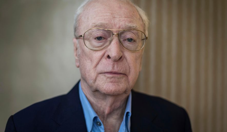 British actor Michael Caine poses for a photograph in London, Oct. 11, 2018. (Photo by Vianney Le Caer/Invision/AP, File)