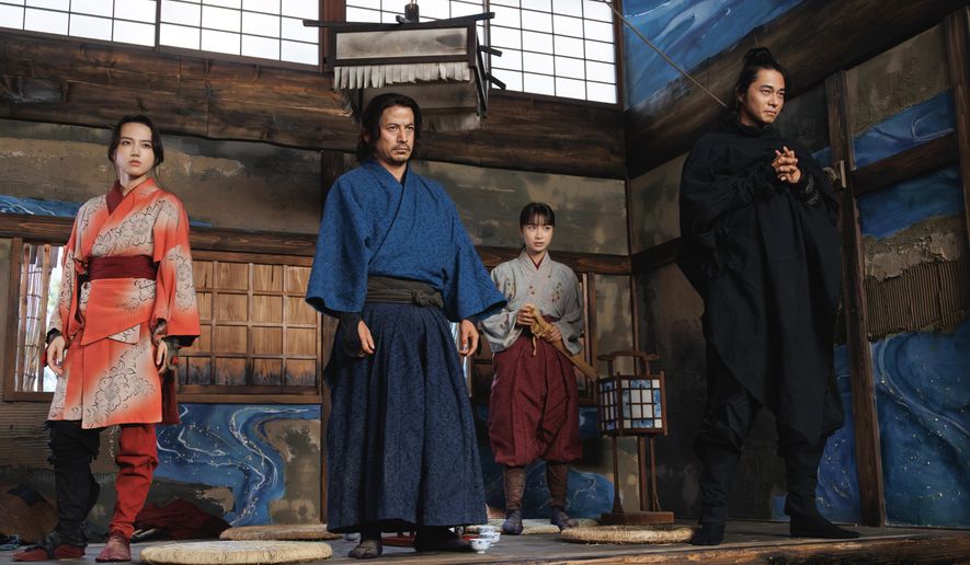 This image released by Netflix shows, from left, Junichi Okada, Yumia Fujisaki, Kaya Kiyohara and Masahiro Higashide in a scene from "The Last Samurai Standing." (Chihoko Ishii/Netflix via AP)