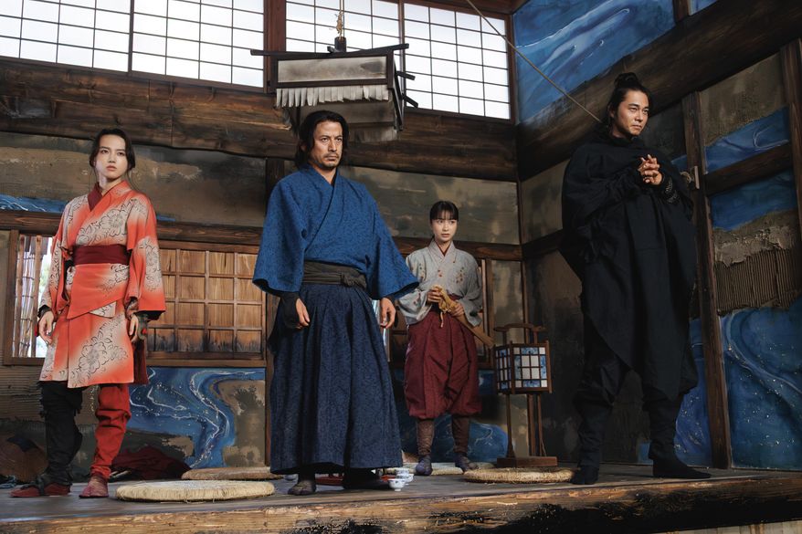 This image released by Netflix shows, from left, Junichi Okada, Yumia Fujisaki, Kaya Kiyohara and Masahiro Higashide in a scene from "The Last Samurai Standing." (Chihoko Ishii/Netflix via AP)