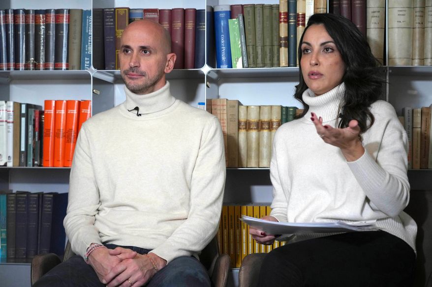 Silvia Carlucci, right, and Domenico Fabiani, two employees who were fired by the Vatican Bank in October 2024, after their wedding violated a ban on workplace marriage attend an interview with The Associated Press in Rome, Monday, Jan. 27, 2025. (AP Photo/Alessandra Tarantino, File)