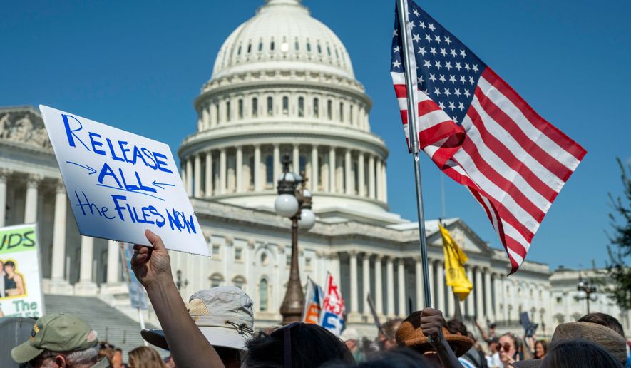 Protesters rally at a news conference calling for Congress to release all of the Jeffrey Epstein files, outside the U.S. Capitol, Wednesday, Sept. 3, 2025 in Washington. (AP Photo/Kevin Wolf)