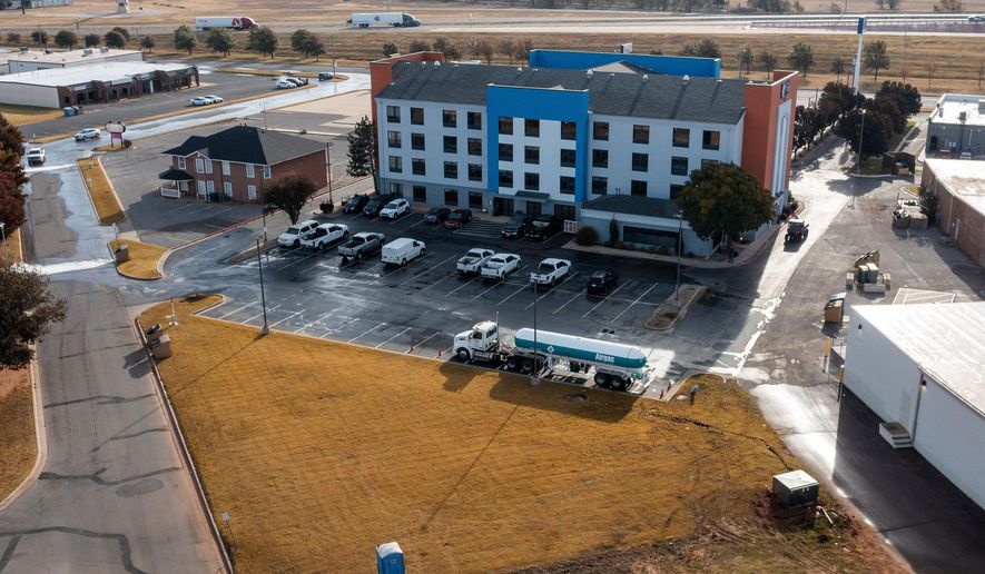 The scene of an ammonia spill at the Holiday Inn Express in Weatherford, Okla. on Thursday, Nov. 13, 2025. (AP Photo/Alonzo Adams)