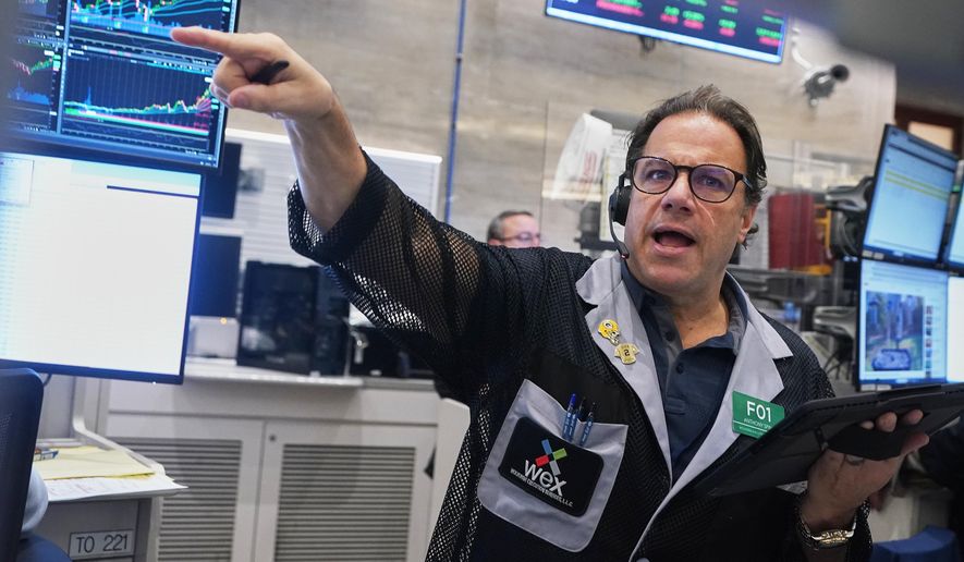 Options trader Anthony Spina works on the floor of the New York Stock Exchange, Wednesday, Nov. 12, 2025. (AP Photo/Richard Drew)