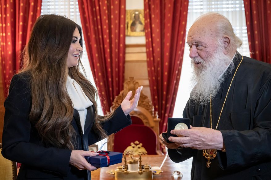Kimberly Guilfoyle, U.S. Ambassador to Greece, left, meets the Archbishop of Athens and leader of Greece's Orthodox Church, Ieronymos II in Athens, Thursday, Nov 13, 2025. (Aris Messinis/ Pool Photo via AP)
