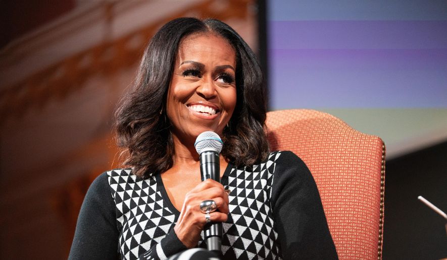 Former first lady Michelle Obama speaks about her new book "The Look" during an event at Sixth and I, Wednesday, Nov. 12, 2025, in Washington. (AP Photo/Allison Robbert)