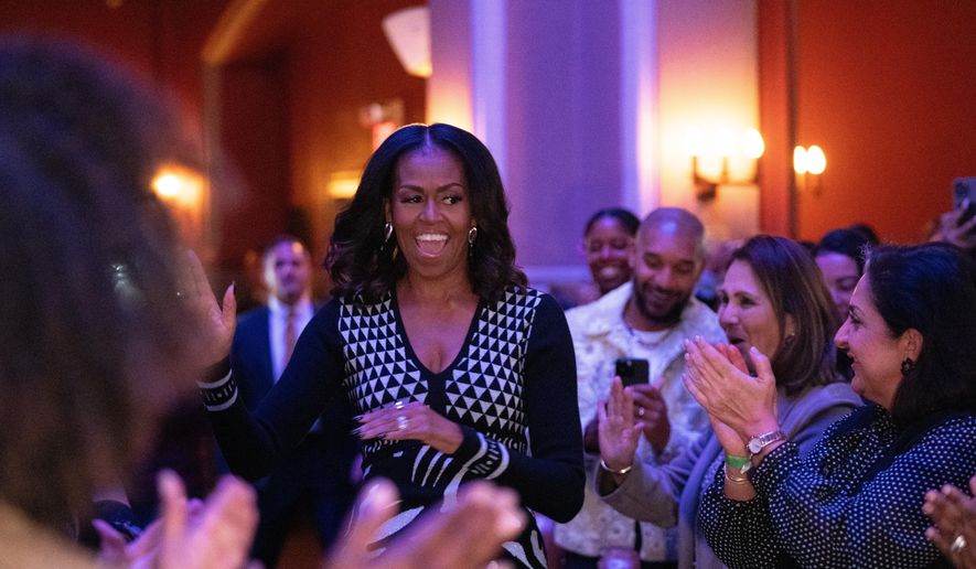 Former first lady Michelle Obama speaks about her new book "The Look" during an event at Sixth and I, Wednesday, Nov. 12, 2025, in Washington. (AP Photo/Allison Robbert)