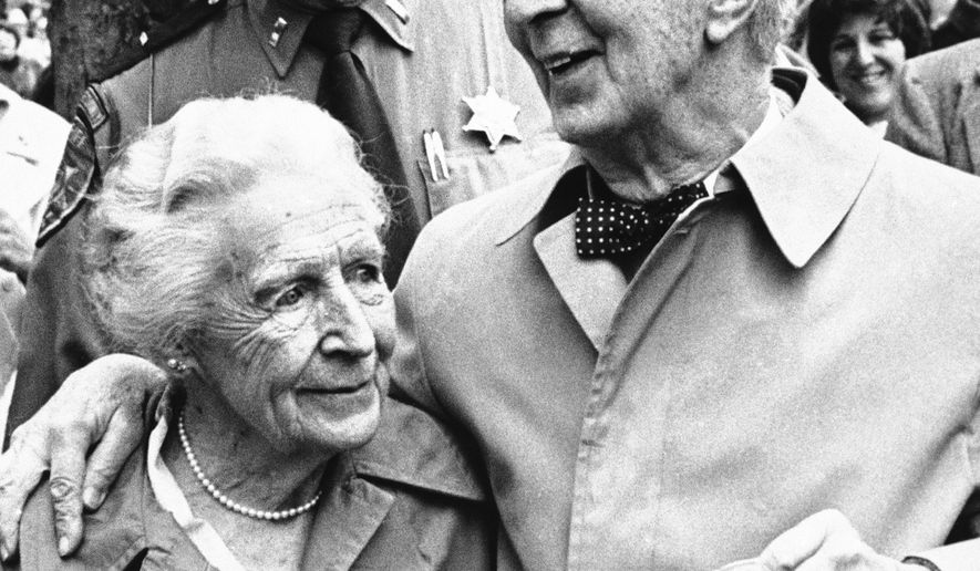 Artist Norman Rockwell, right and his wife Molly, left, in his last public appearance at a 'Norman Rockwell Day' parade in Stockbridge, Mass., Nov. 9, 1978. (AP Photo, File)