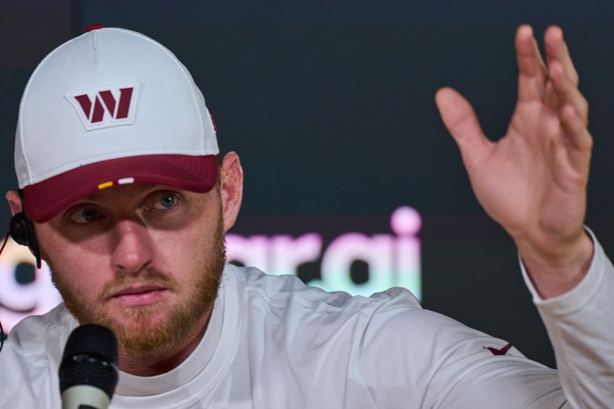 Washington Commanders place kicker Matt Gay (16) attends a press conference in Madrid, Spain, Friday, Nov. 14, 2025, ahead of Sunday's NFL football game against Miami Dolphins. (AP Photo/Bernat Armangue)