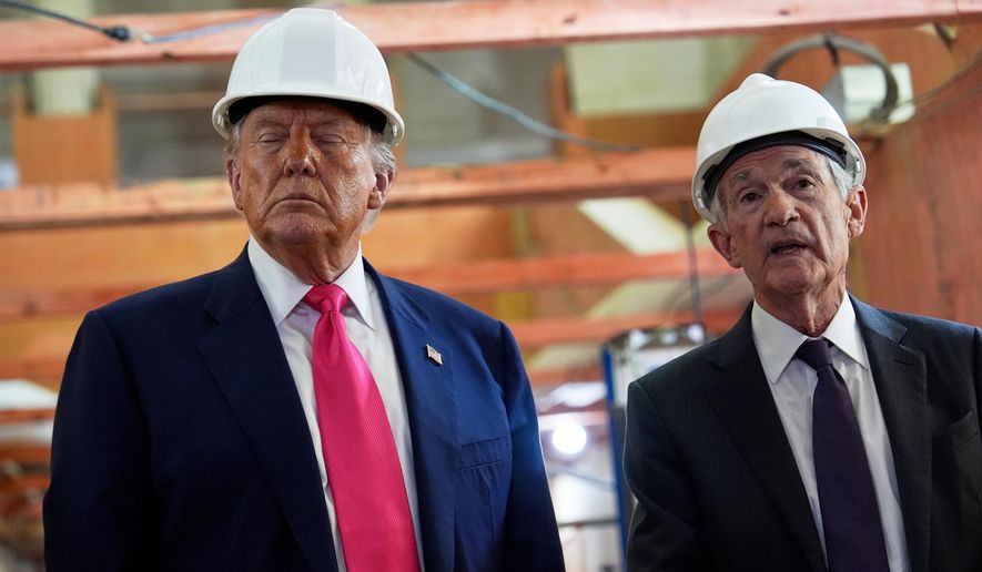 President Donald Trump listens as Federal Reserve Chairman Jerome Powell speaks during a visit to the Federal Reserve in Washington on July 24, 2025. (AP Photo/Julia Demaree Nikhinson) **FILE**