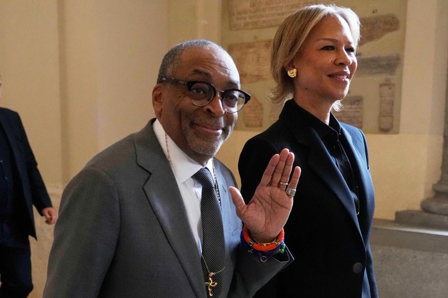 Film Director Spike Lee and his wife Tonya Lewis Lee leave at the end of an audience of Pope Leo XIV with actors and directors from the cinema, at the Vatican, Saturday, Nov. 15, 2025. (AP Photo/Gregorio Borgia)