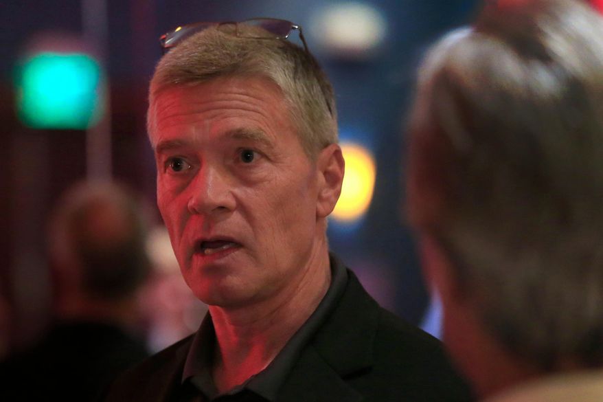 Republican 3rd district congressional candidate Greg Goode talks with supporters at a Johnson County Republican election watch party in Overland Park, Kan., Aug. 2, 2016. (AP Photo/Orlin Wagner) **FILE**