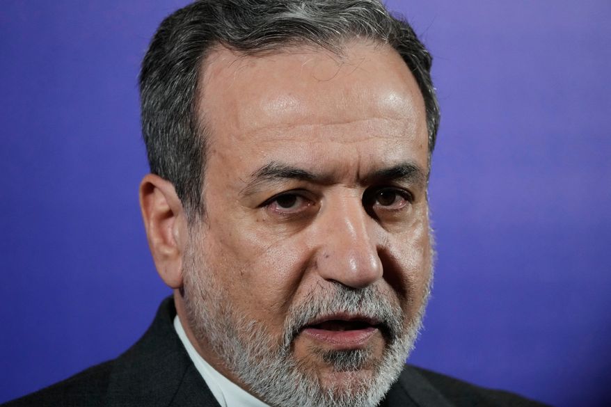 Iranian Foreign Minister Abbas Araghchi speaks in a new briefing after attending a conference titled "International Law Under Assault: Aggression and Self-Defense," in Tehran, Iran, Sunday, Nov. 16, 2025. (AP Photo/Vahid Salemi)