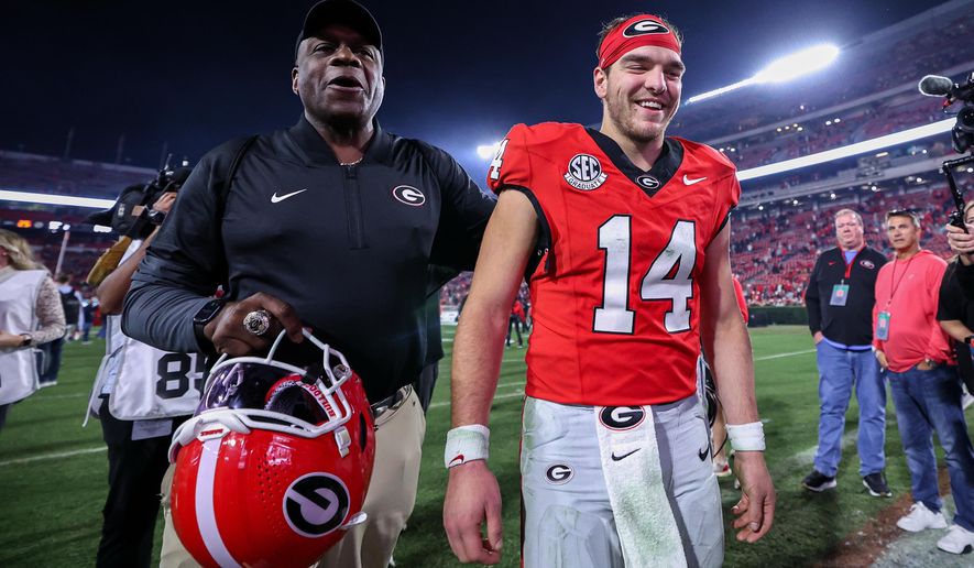 Georgia quarterback Gunner Stockton (14) reacts after an NCAA college football game against Texas, Saturday, Nov. 15, 2025, in Athens, Ga. (AP Photo/Colin Hubbard)