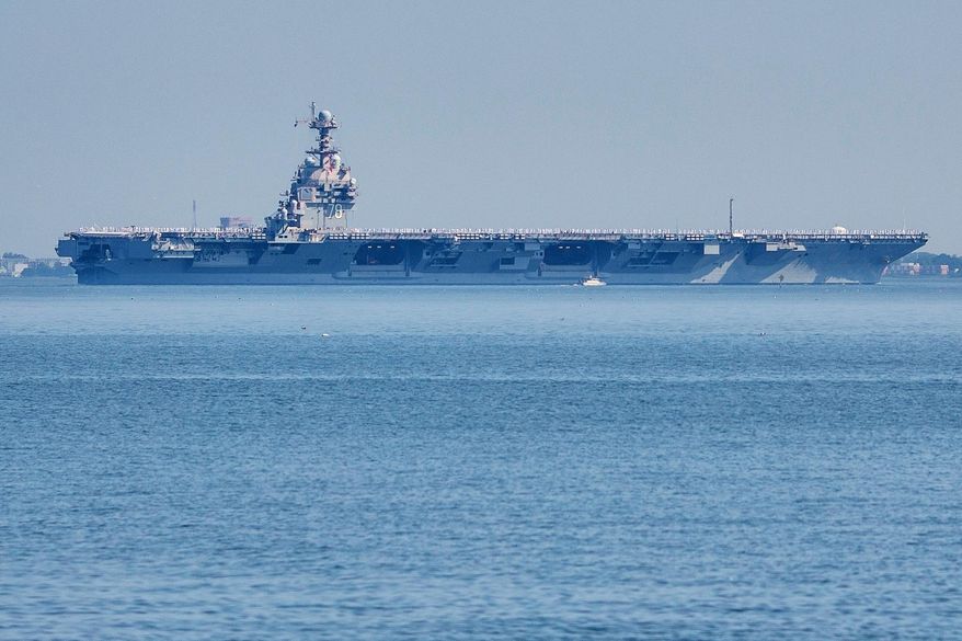 FILE The USS Gerald R. Ford aircraft carrier leaves Naval Station Norfolk, June 23, 2025, in Norfolk, Va. (AP Photo/John Clark, File)