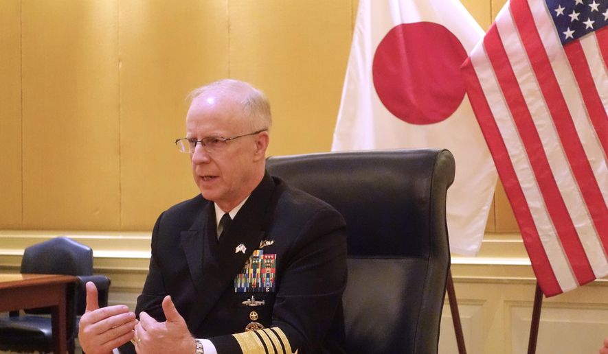 U.S. Chief of Naval Operations, Adm. Daryl Caudle, talks to selected journalists during his visit in Tokyo, Monday, Nov. 17, 2025. (AP Photo/Mari Yamaguchi)