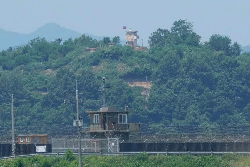 A North Korean military guard post, top, and a South Korean post, bottom, are seen from Paju, South Korea, near the border with North Korea, on June 18, 2024. (AP Photo/Ahn Young-joon, File)