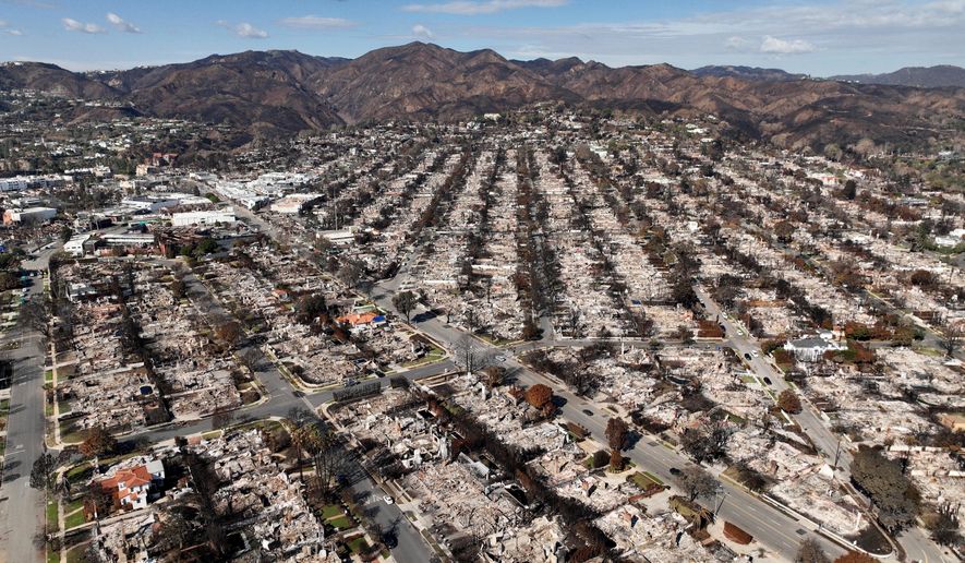 FILE - The devastation from the Palisades Fire is shown in an aerial view in the Pacific Palisades neighborhood of Los Angeles, Jan. 27, 2025. (AP Photo/Jae C. Hong, file)