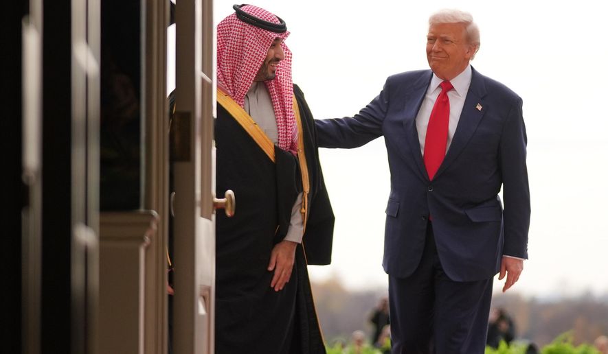President Donald Trump welcomes Saudi Arabia's Crown Prince Mohammed bin Salman to the White House, Tuesday, Nov. 18, 2025, in Washington. (AP Photo/Evan Vucci)