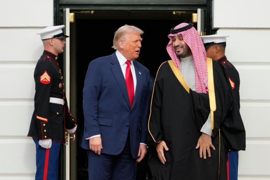 President Donald Trump welcomes Saudi Arabia's Crown Prince Mohammed bin Salman to the White House, Tuesday, Nov. 18, 2025, in Washington. (AP Photo/Mark Schiefelbein)