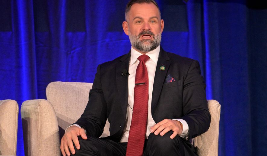 FILE - Rep. Cory Mills, R-Fla., participates in a discussion about Israel at the Republican Party of Florida Freedom Summit, Nov. 4, 2023, in Kissimmee, Fla. (AP Photo/Phelan M. Ebenhack, File)