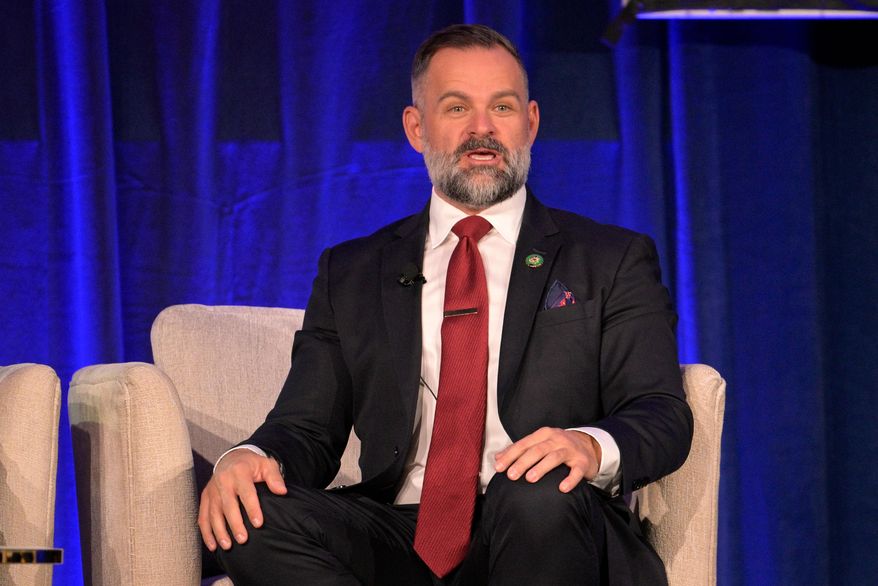 FILE - Rep. Cory Mills, R-Fla., participates in a discussion about Israel at the Republican Party of Florida Freedom Summit, Nov. 4, 2023, in Kissimmee, Fla. (AP Photo/Phelan M. Ebenhack, File)