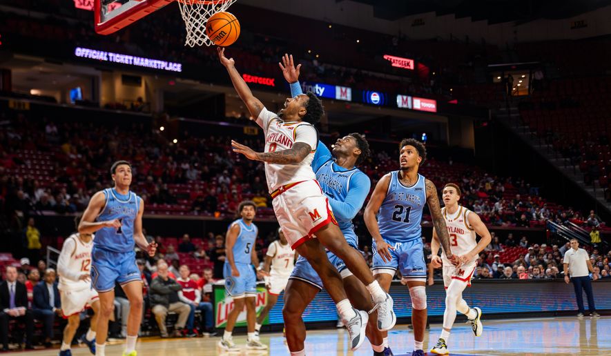 Maryland guard Diggy Coit (8) drives for a layup in an NCAA men's basketball game against Mount St. Mary's, Wednesday, Nov. 19, 2025 at Xfinity Center in College Park, Md. (All-Pro Reels/Andrew Banez)