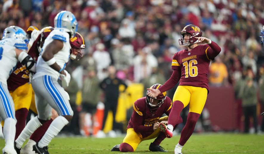Washington Commanders kicker Matt Gay watches his 44-yard field goal during the first half of an NFL football game against the Detroit Lions Sunday, Nov. 9, 2025, in Landover, Md. (AP Photo/Stephanie Scarbrough)
