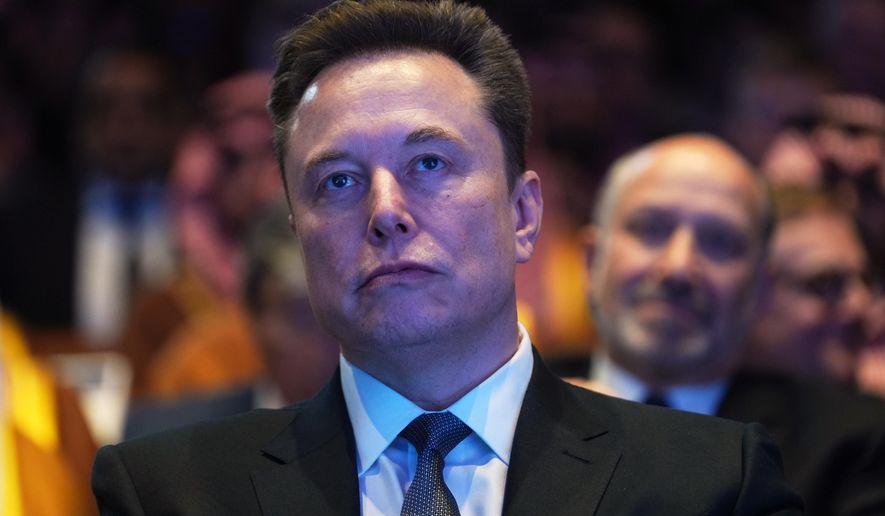 Elon Musk attends the Saudi Investment Forum at the Kennedy Center, Wednesday, Nov. 19, 2025, in Washington. (AP Photo/Evan Vucci)