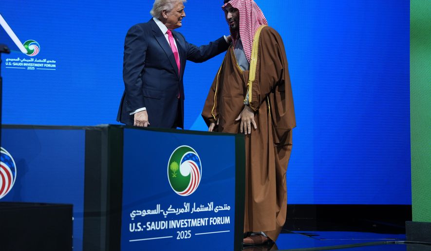 President Donald Trump speaks with Saudi Arabia's Crown Prince Mohammed bin Salman during the Saudi Investment Forum at the Kennedy Center, Wednesday, Nov. 19, 2025, in Washington. (AP Photo/Evan Vucci)