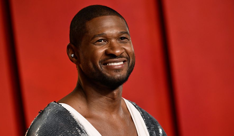 FILE - Usher arrives at the Vanity Fair Oscar Party on March 10, 2024, at the Wallis Annenberg Center for the Performing Arts in Beverly Hills, Calif. (Photo by Evan Agostini/Invision/AP, File)