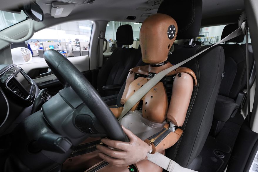 A THOR-5F female crash test dummy is shown in a driver's seat at Humanetics in Farmington Hills, Mich., on June 10, 2025. (AP Photo/Paul Sancya) **FILE**