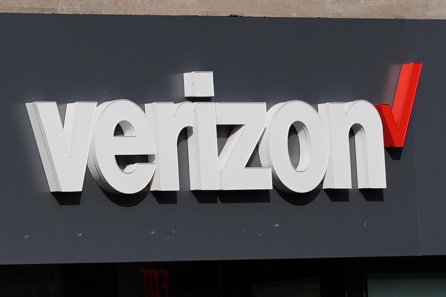 A Verizon sign is displayed on a store, Sept. 30, 2025, in Cambridge, Mass. (AP Photo/Charles Krupa, File)