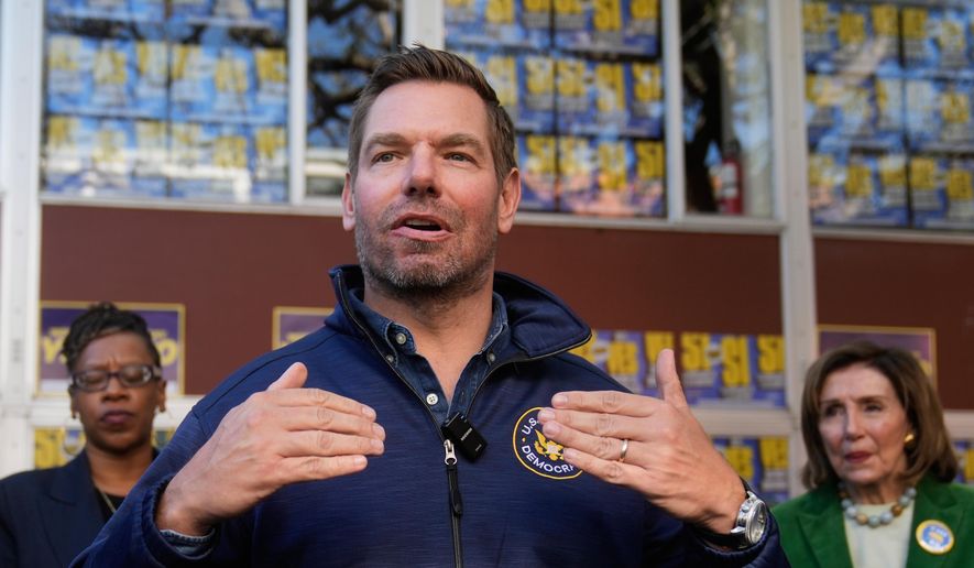 FILE - Rep. Eric Swalwell, D-Calif., speaks to reporters after a campaign event on Proposition 50 in San Francisco, on Nov. 3, 2025. (AP Photo/Jeff Chiu, File)