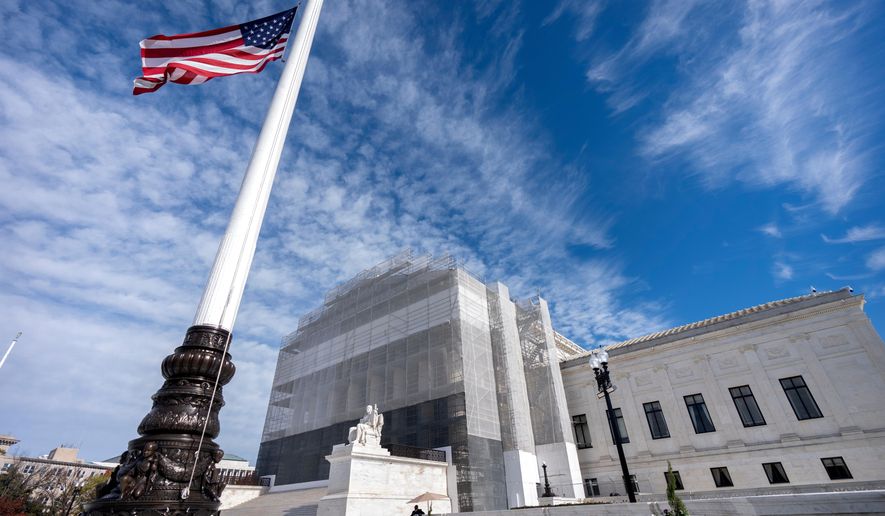An American flag flies at half-staff outside the Supreme Court Nov. 5, 2025, in Washington. (AP Photo/Mark Schiefelbein, File)