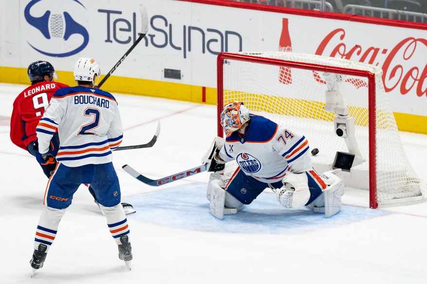 Washington Capitals right wing Ryan Leonard (9) backhands the puck past Edmonton Oilers goalie Stuart Skinner (74) for his second goal of the game and his fifth goal of the season at Capital One Arena, Washington, D.C., November 19, 2025. (Photo by Brian Murphy for the Washington Times)