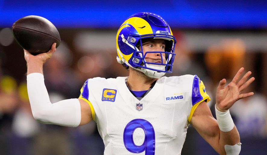 Los Angeles Rams quarterback Matthew Stafford passes against the Tampa Bay Buccaneers during the first half of an NFL football game, Sunday, Nov. 23, 2025, in Inglewood, Calif. (AP Photo/Mark J. Terrill)