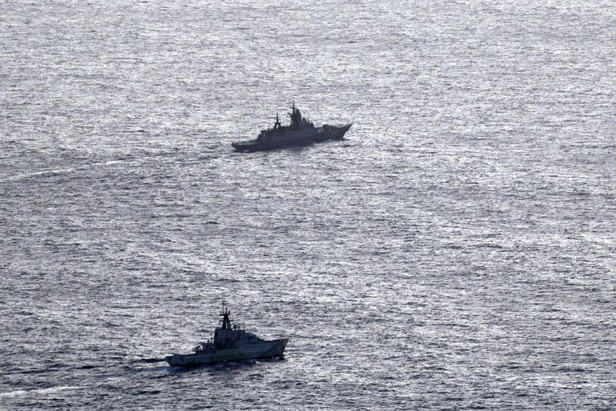 In this undated aerial photo released by the United Kingdom Ministry of Defence, HMS Severn, lower section, is seen tracking the Russian corvette RFN Stoikiy off the UK coast. (United Kingdom Ministry of Defence via AP)