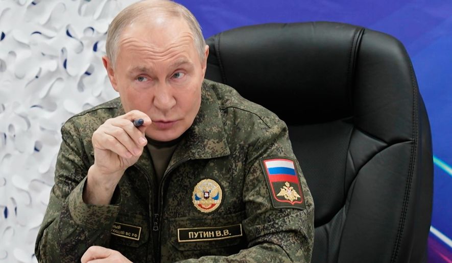 In this image taken from video provided by Russian Presidential Press Service on Thursday, Nov. 20, 2025, Russian President Vladimir Putin speaks as he visits one of the command posts of the West group of Russian Army in an undisclosed location. (Russian Presidential Press Service via AP)
