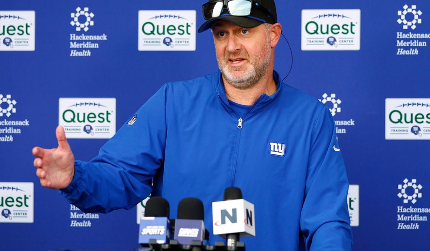 FILE - New York Giants defensive coordinator Shane Bowen talks to reporters before NFL football practice in East Rutherford, N.J., Thursday, June 5, 2025. (AP Photo/Noah K. Murray, file)