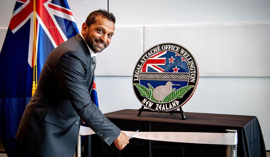 FILE - In this photo released by the U.S. Embassy in Wellington, New Zealand, FBI Director Kash Patel cuts the ribbon at the official opening of the FBI office in Wellington, New Zealand, July 31, 2025. (Ola Thorsen/U.S. Embassy via AP, File)
